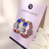 Orecchini a cerchio "Capricorno" con Camelia Bianca e cristalli multicolore